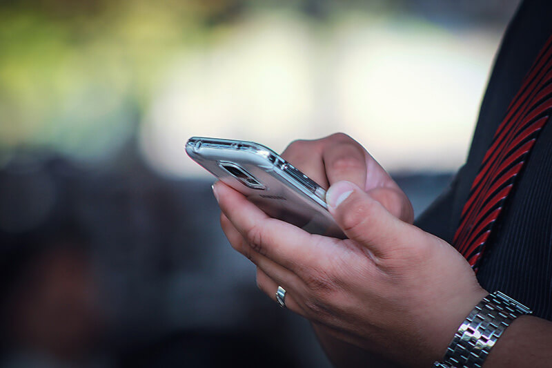 A person tuning in to the sunday service via phone